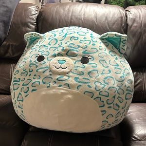 A rare xl turquoise cheetah squishmallow.